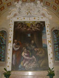 Nativita di Gesu con SBernardino e SFrancesco 1560